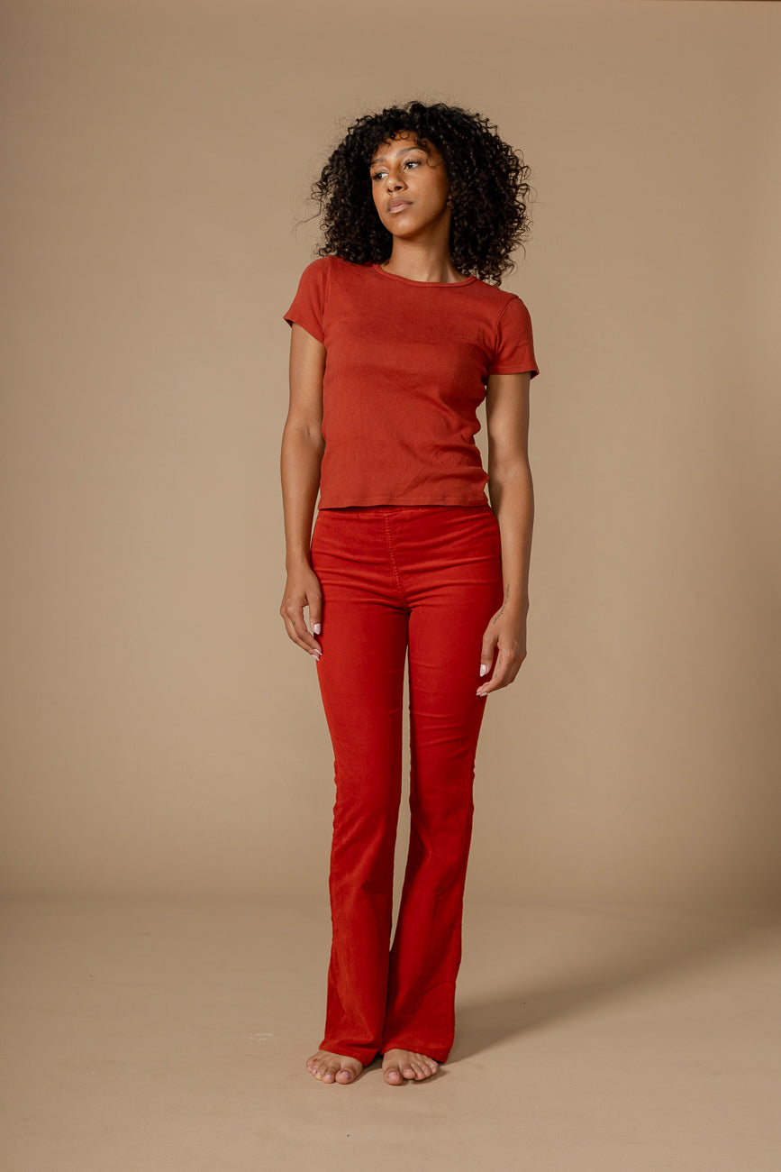 Elevate your fall wardrobe with the Lark Bootcut Pull-On Pant in Burnt Sienna. Enjoy a flattering fit through the hips and thighs for effortless style and comfort.