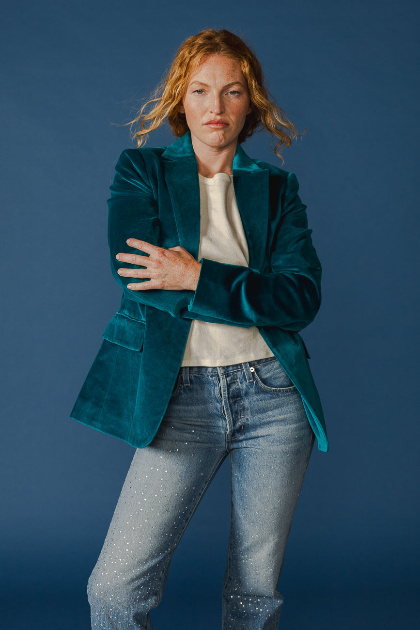 Elevate your style with our Deep Lagoon Velvet Blazer. This tailored slim fit classic adds a touch of luxury to any outfit, making it a timeless wardrobe essential.